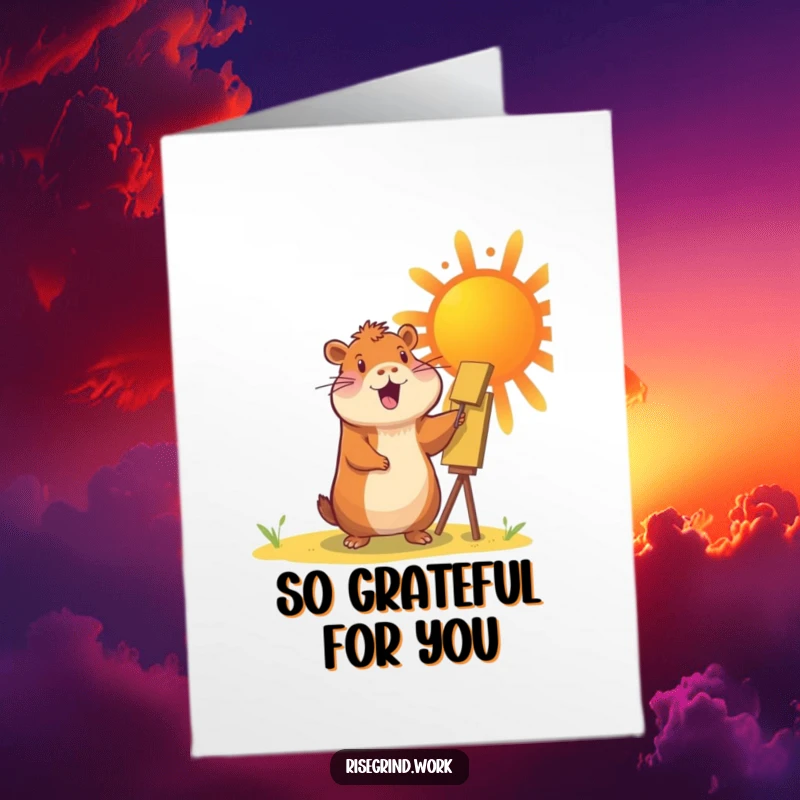 Funny Free Printable Thank You Card: A cheerful capybara happily paints a giant, vibrant sun, radiating warmth and thanks.